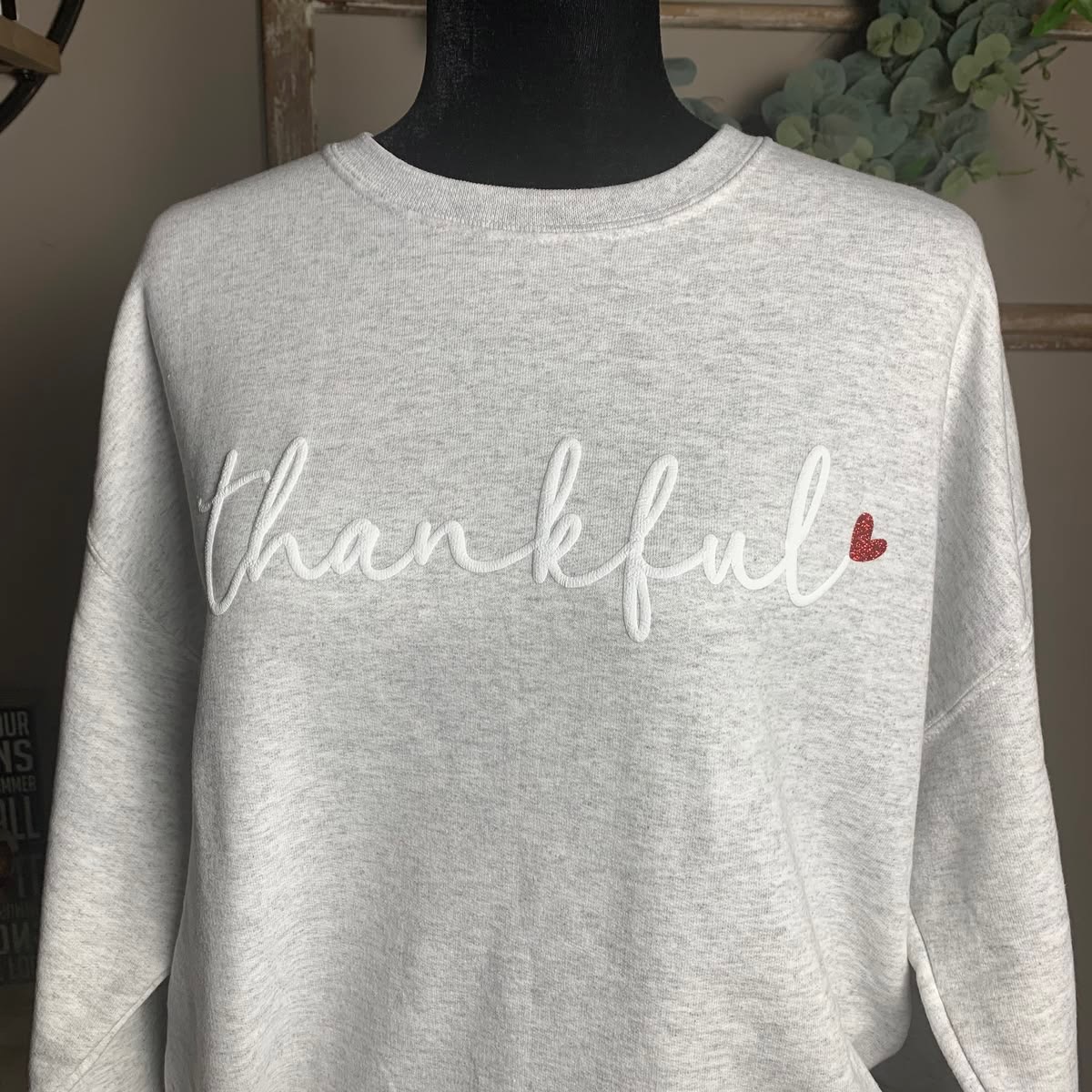 Custom 'thankful' sweatshirt with puff script and glitter heart — real Forever Happy order